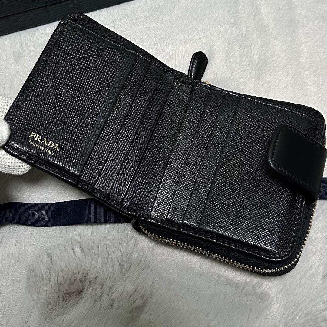 PRADA プラダ　折り財布　ラウンドファスナー　ロゴ金具　サフィアーノレザー