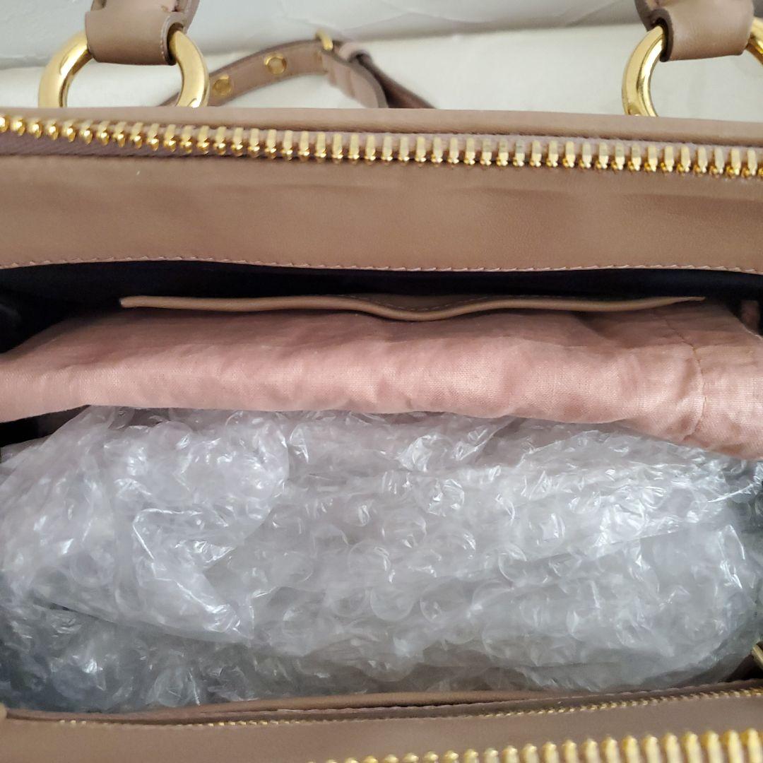 Miu Miu ベージュ キルティングハンドバッグ