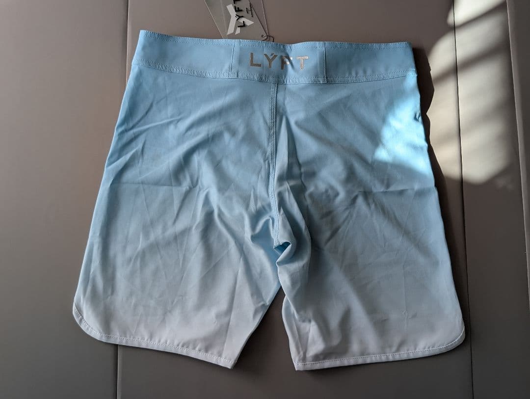 水着・ラッシュガード LYFT GRADATION STAGE SHORTS L.BLUE