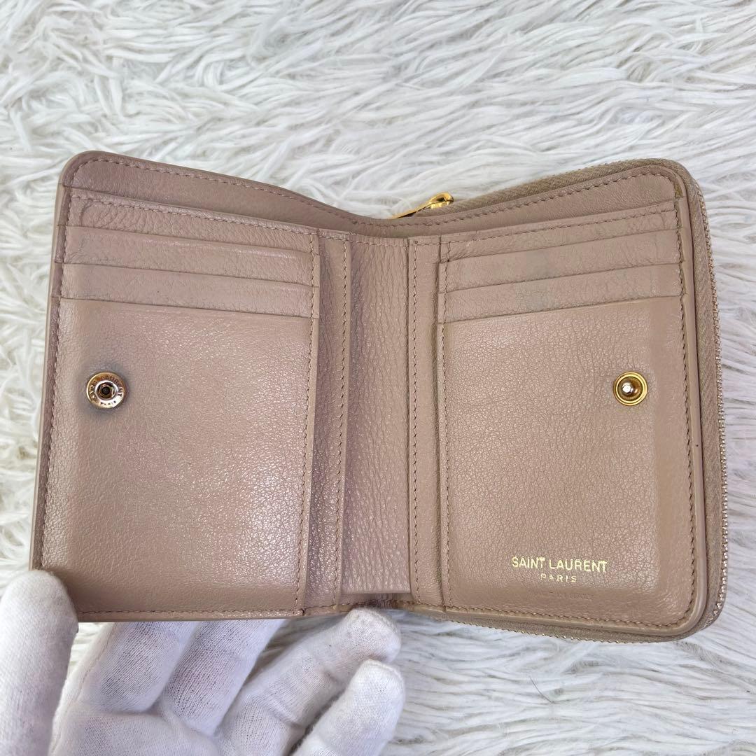 美品/現行✨イヴサンローラン 二つ折り財布　カサンドラ　YSL　ピンクベージュ