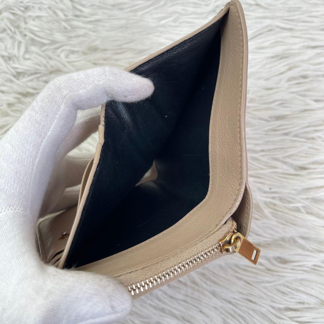 美品/現行✨イヴサンローラン 二つ折り財布　カサンドラ　YSL　ピンクベージュ