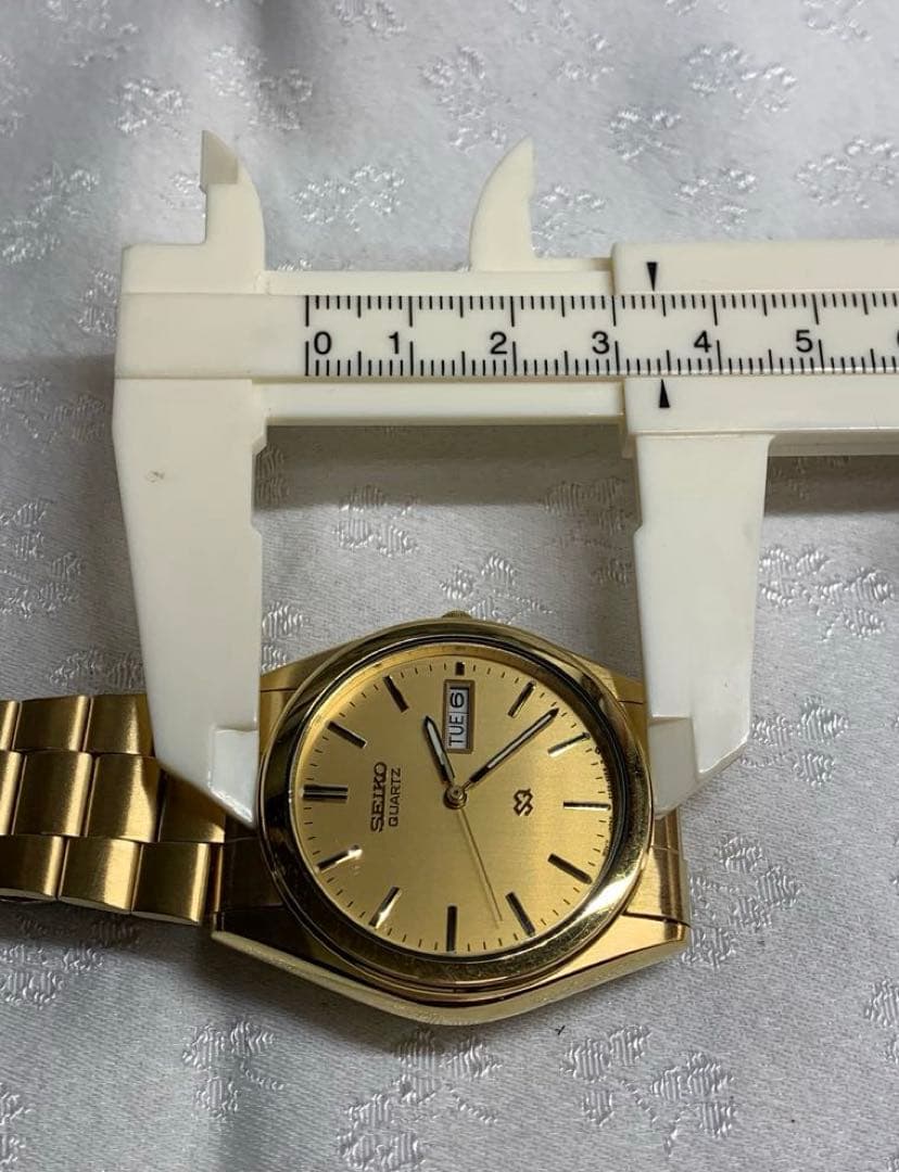 SEIKO SQ 腕時計　メンズ 金色　電池交換済　稼動品