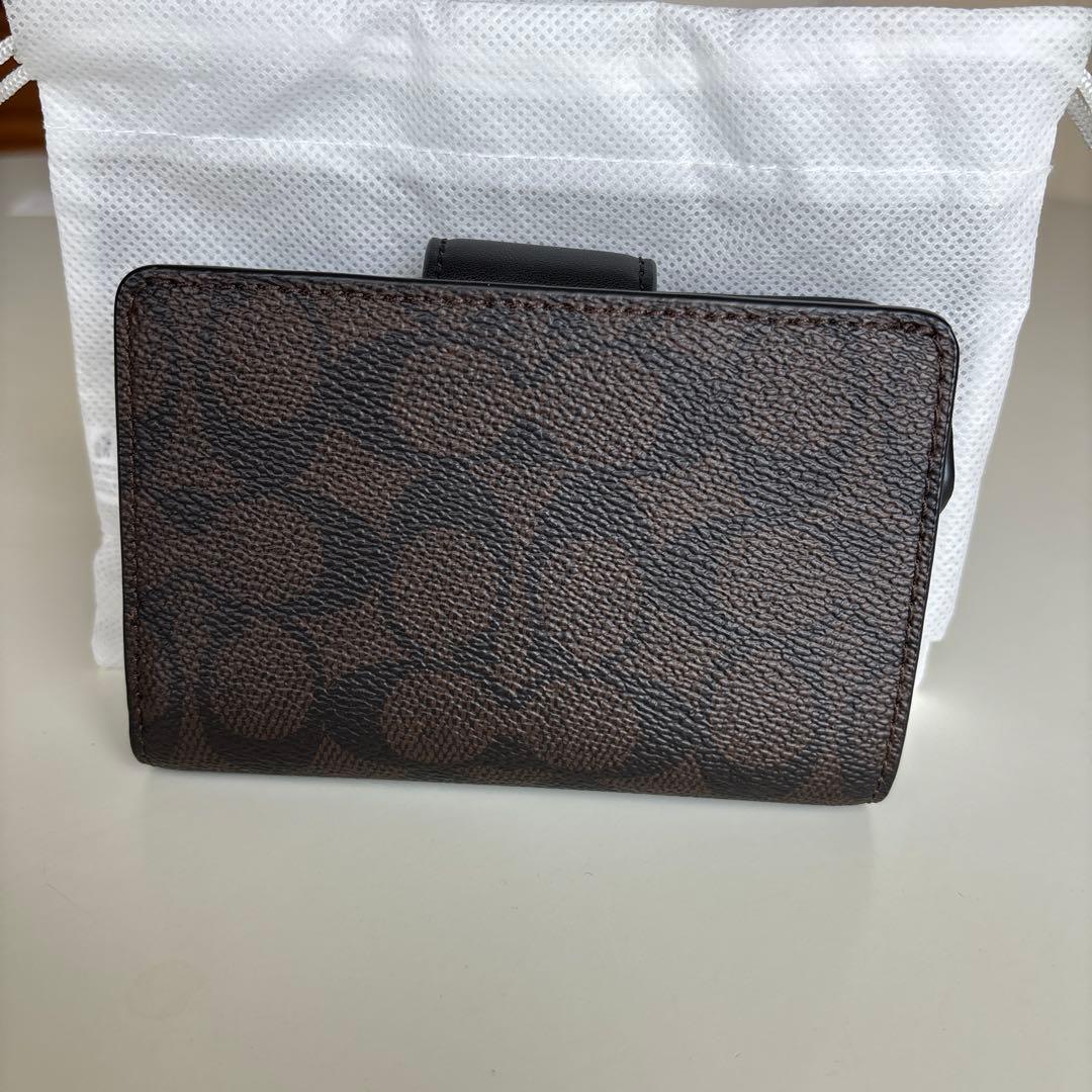 【新品未使用】保存袋付COACHコーチ二つ折り財布 シグネチャー ダークブラウン