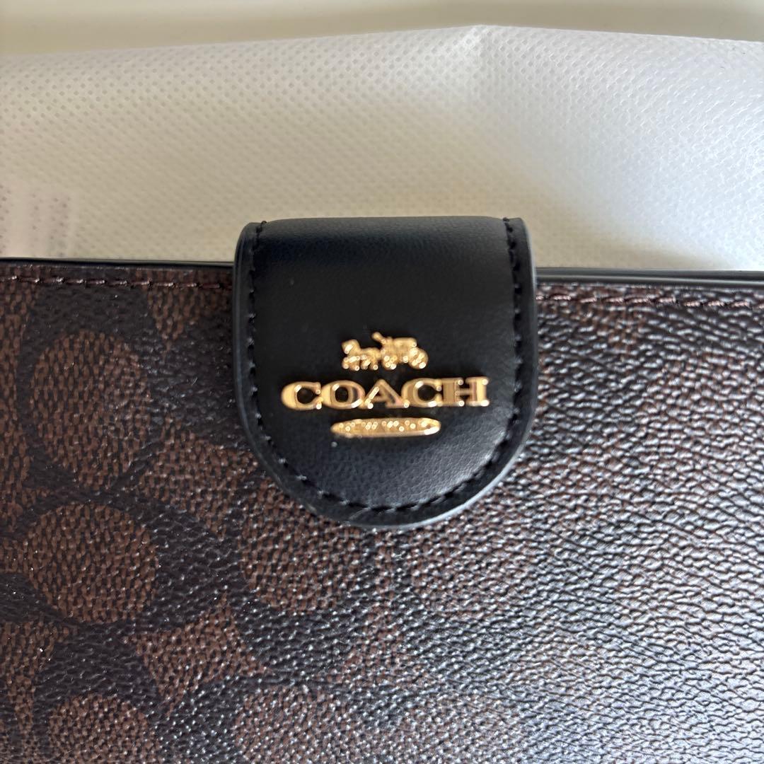 【新品未使用】保存袋付COACHコーチ二つ折り財布 シグネチャー ダークブラウン