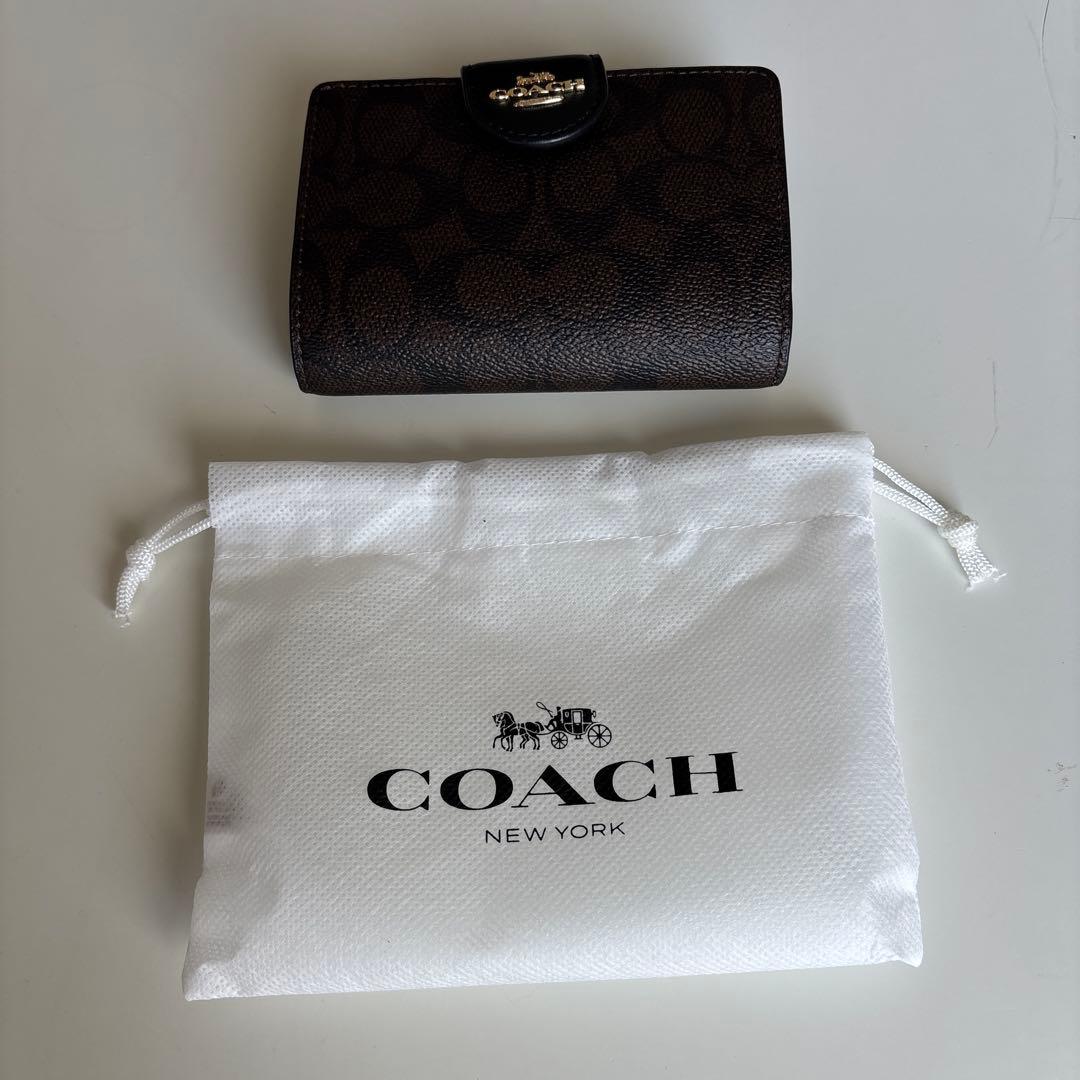 【新品未使用】保存袋付COACHコーチ二つ折り財布 シグネチャー ダークブラウン