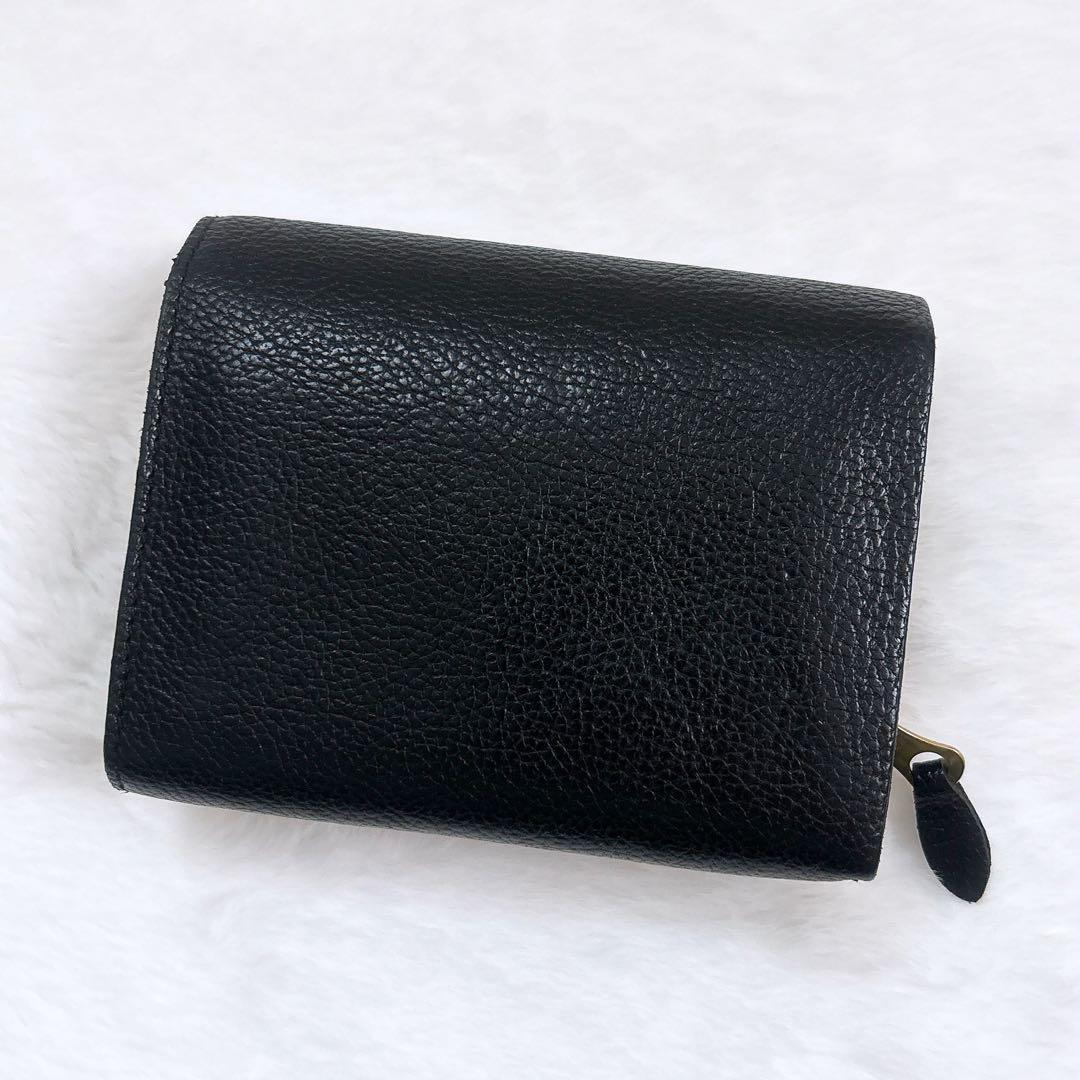 IL BISONTE シュリンクレザー 二つ折り財布 ロゴ刻印 フラップ 黒