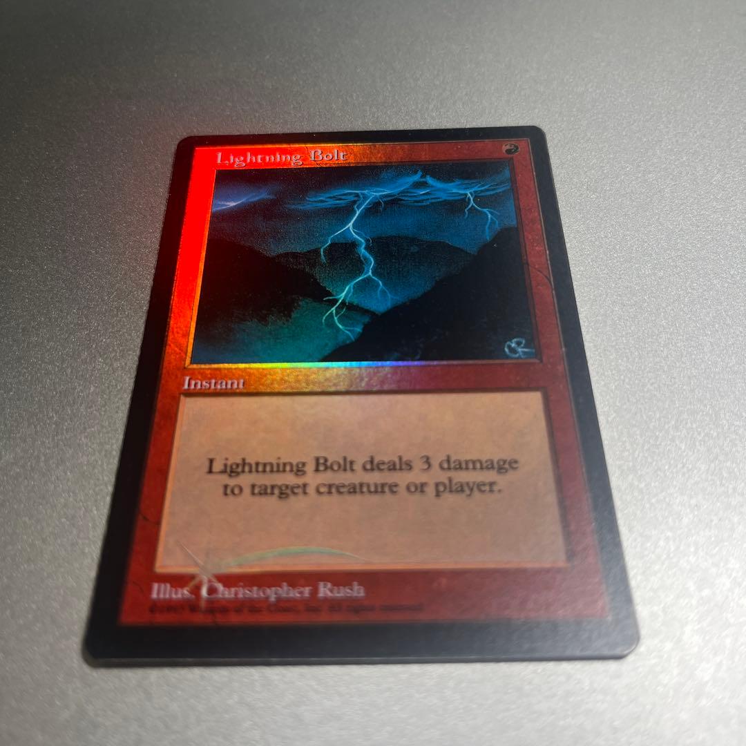④ MTG foil 《稲妻/Lightning Bolt》(ジャッジ褒賞)旧枠