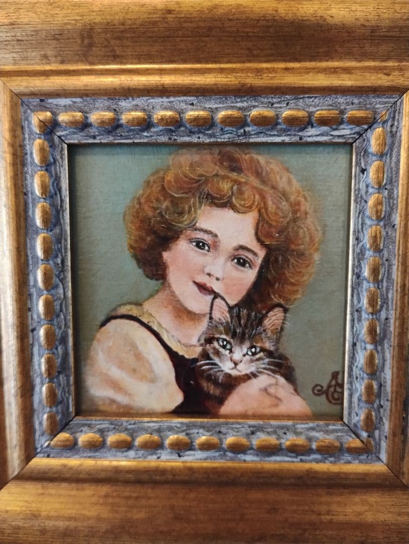 少女と猫の絵画 金色フレーム付き　油絵