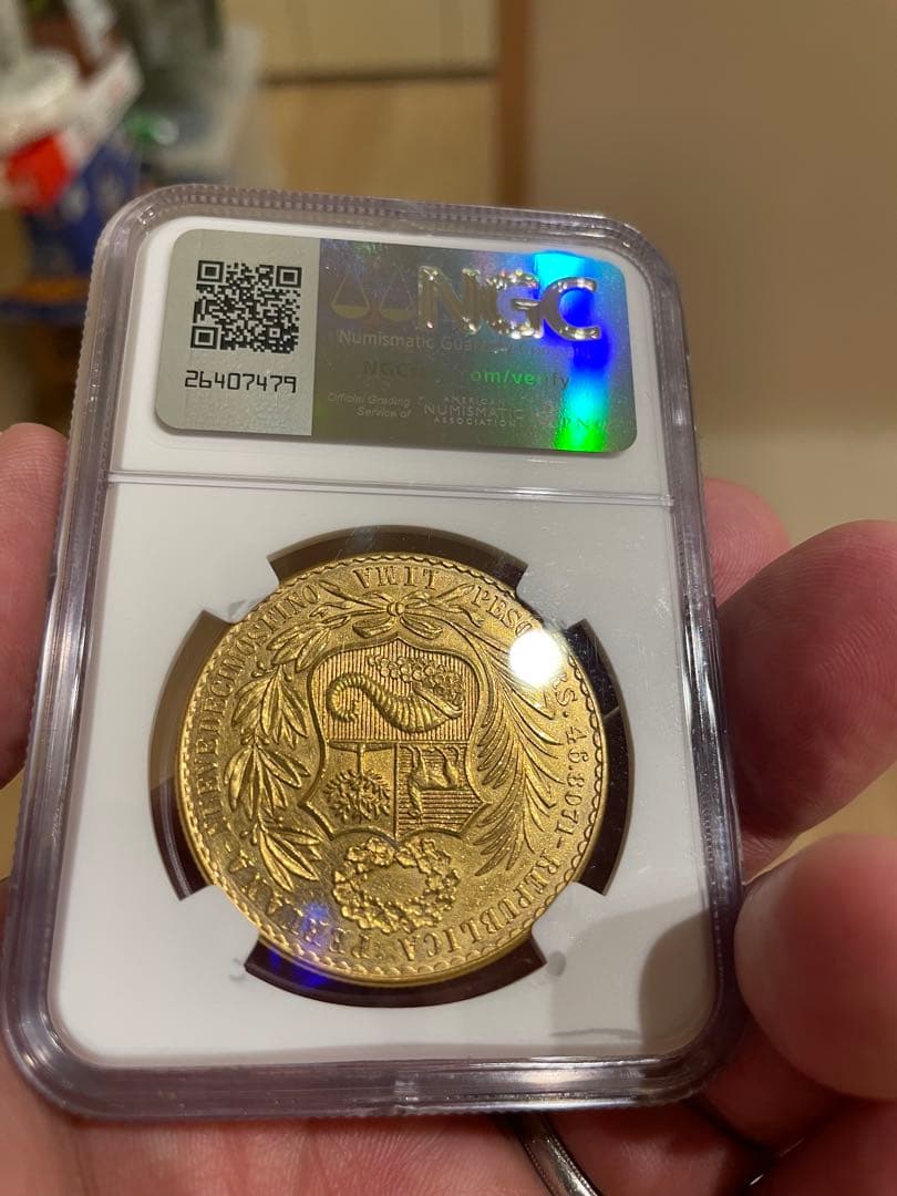 1953 ペルー 100 ソル 金貨 NGC-AU Details
