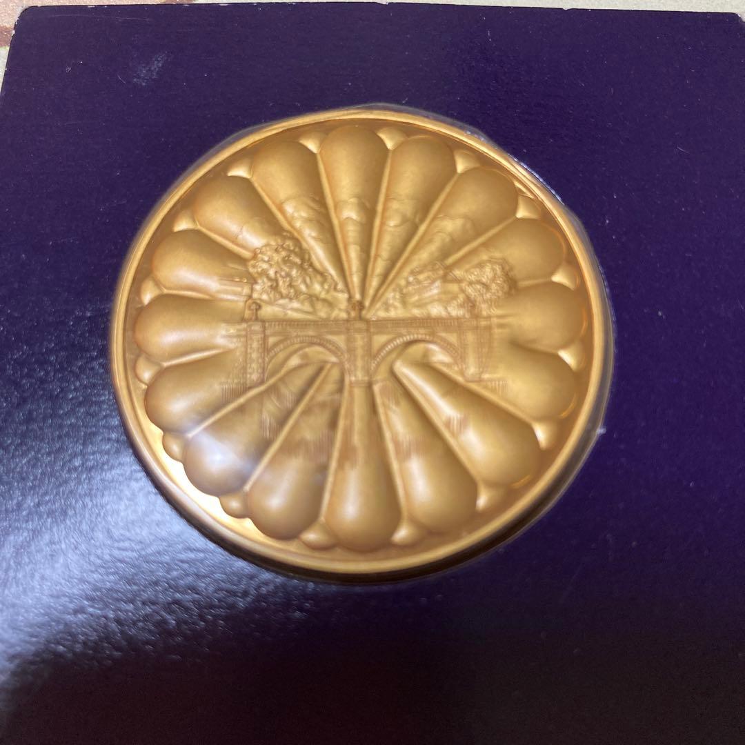 天皇皇后両陛下御大典六十年記念メダル