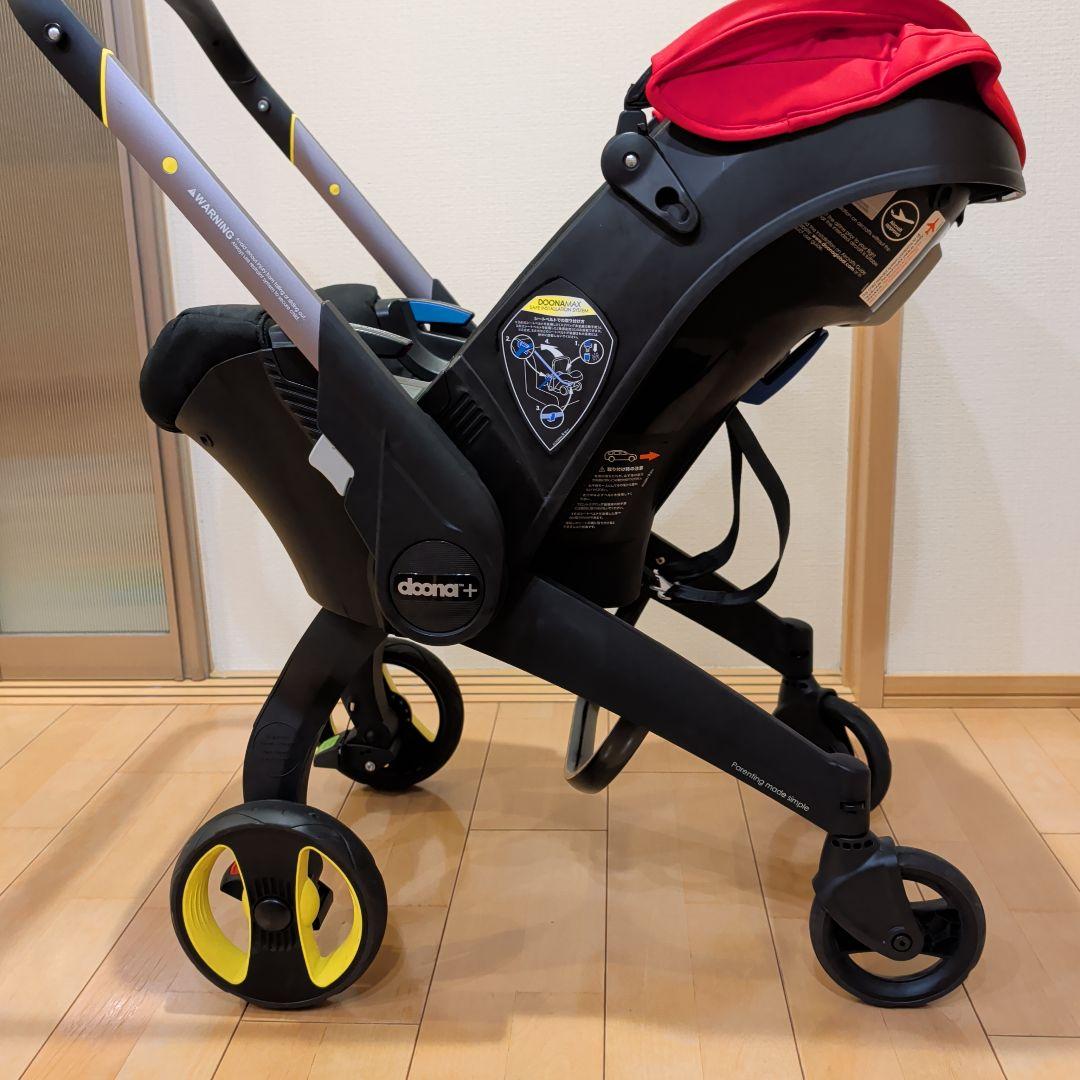 りゅーき美品doonaチャイルドシート フレームレッド　ホイールカバー付き