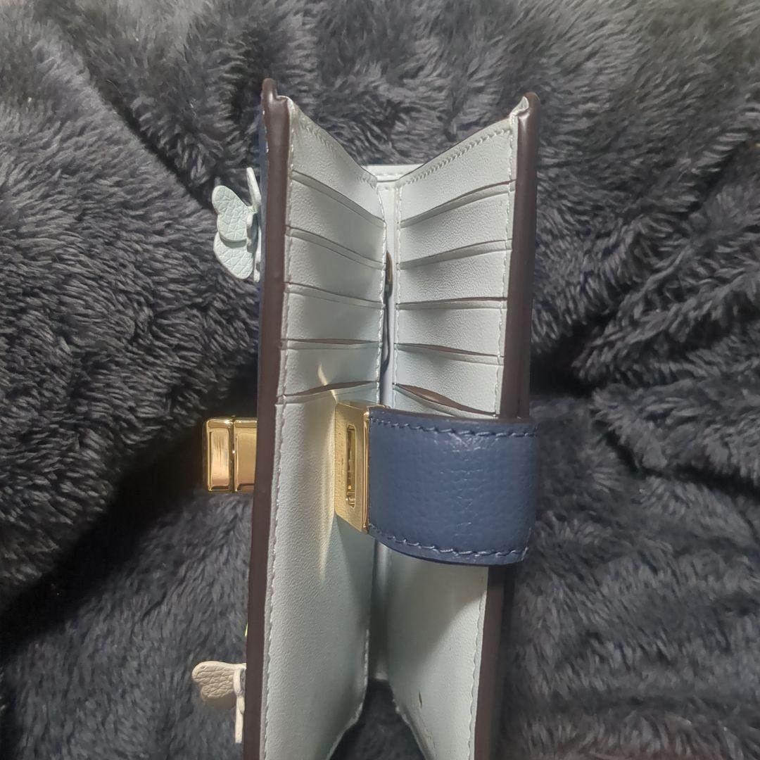 kate spadeフィービーフローラルアップリケターンロックウォレット