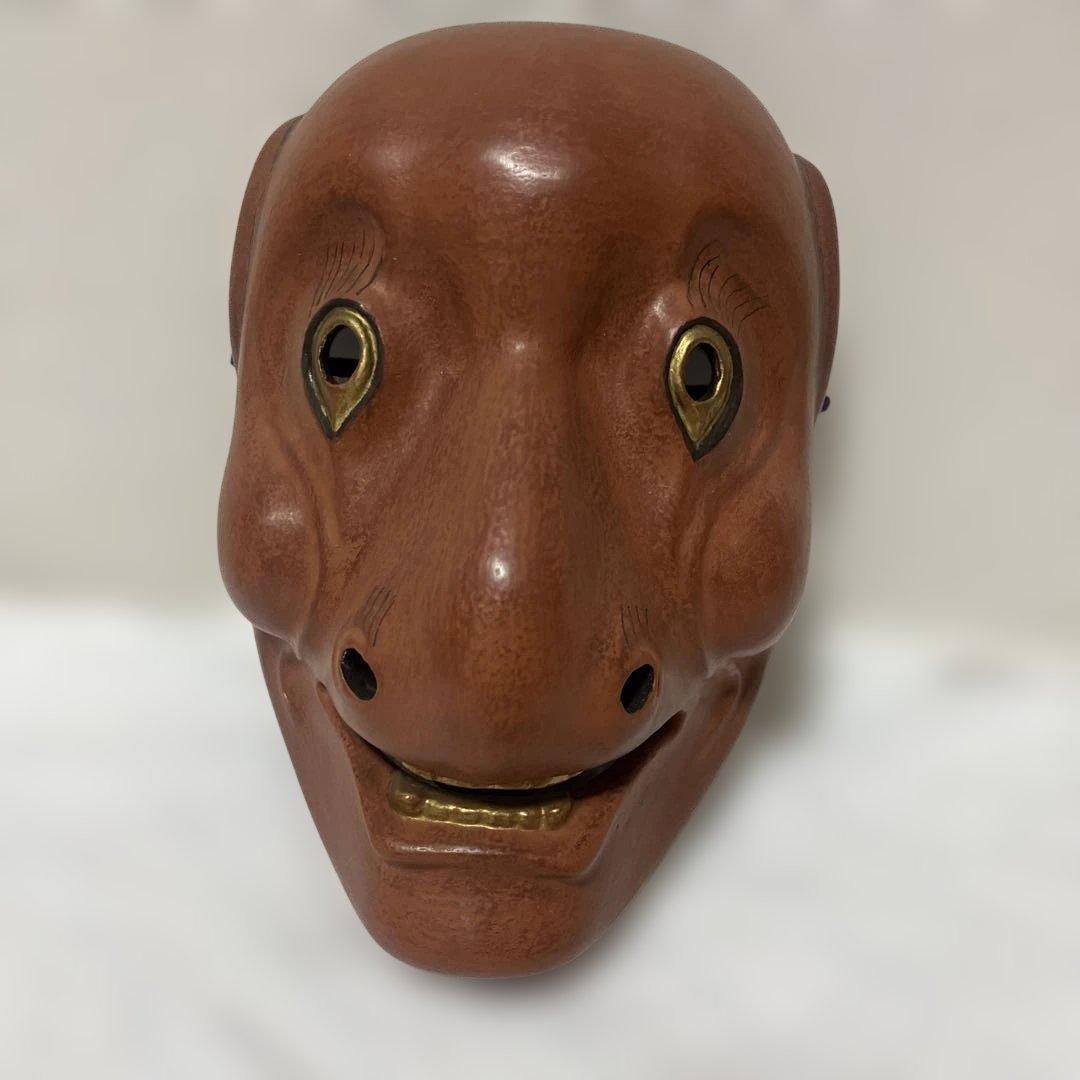木製 能面 茶色 金色の目