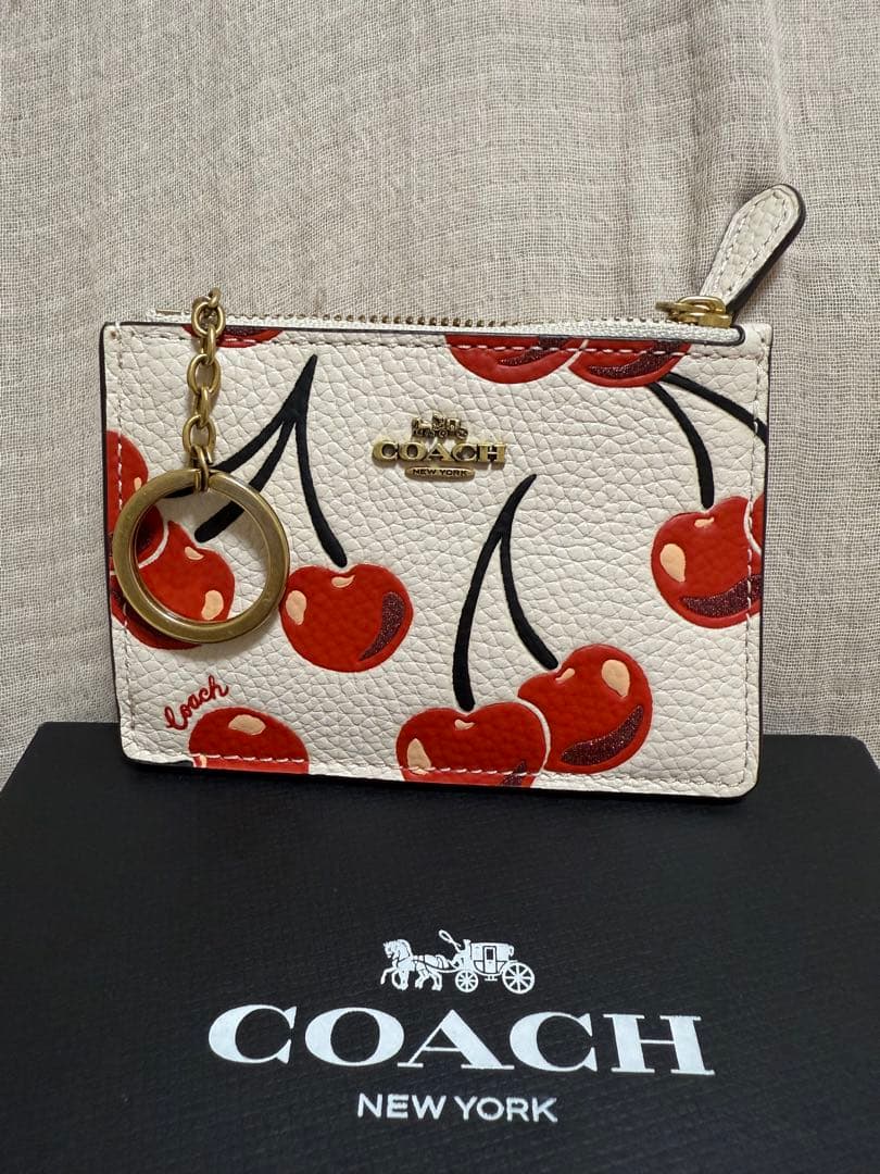 COACH チェリー柄 ケース