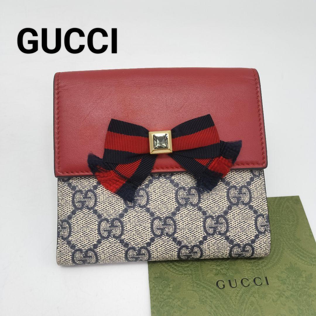 未使用に近い✨グッチ　折り財布　リボン