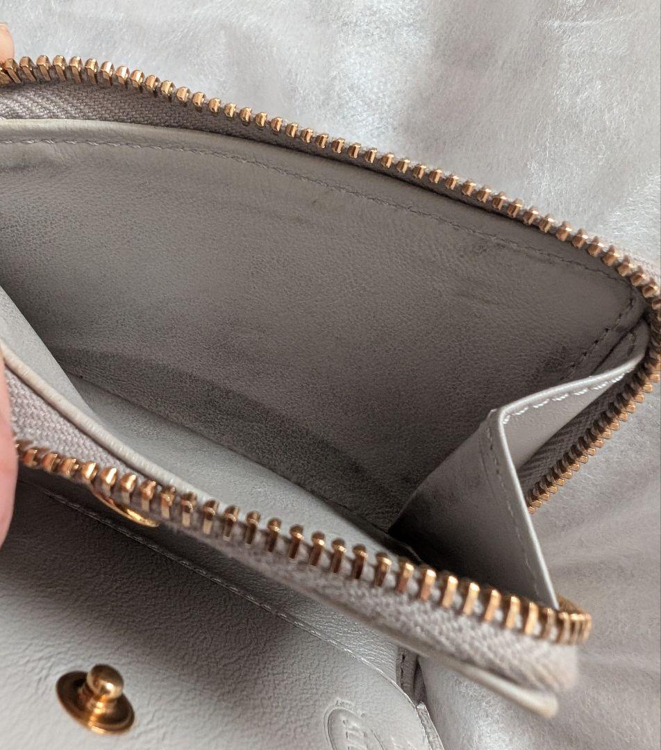 TOD'S 二つ折り財布 ライトグレー