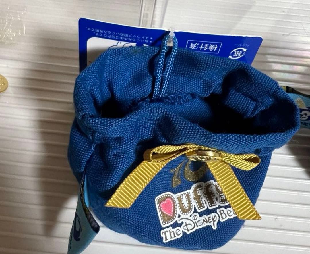 ディズニー、ダッフィー、シェリーメイぬいぐるみバッチ、10周年ストラップチェーン