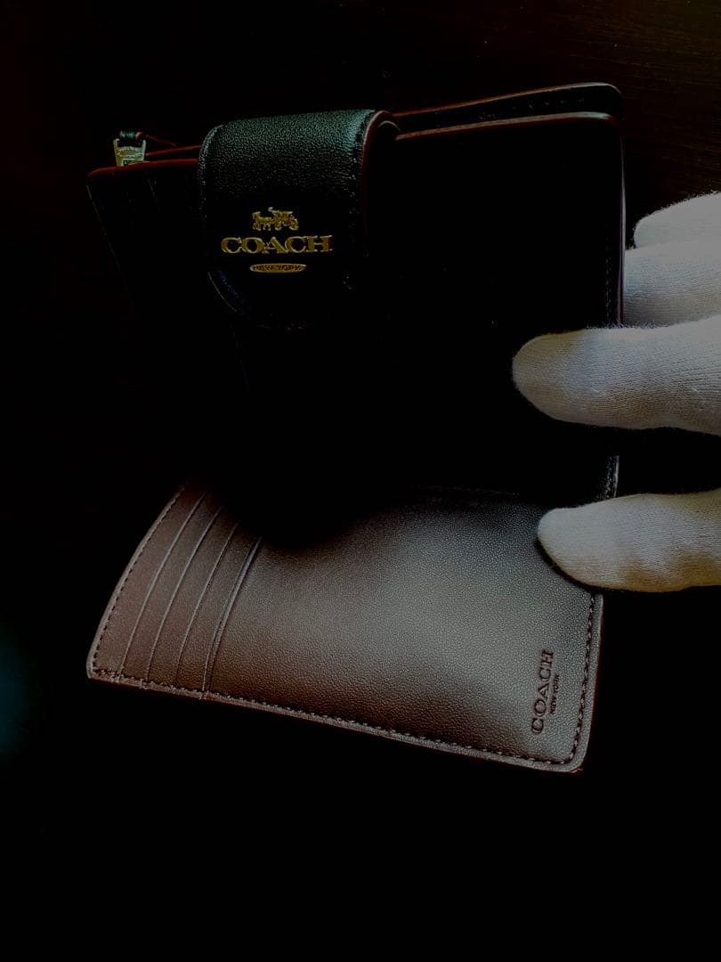 COACH エンボス加工 ブラック 二つ折り財布