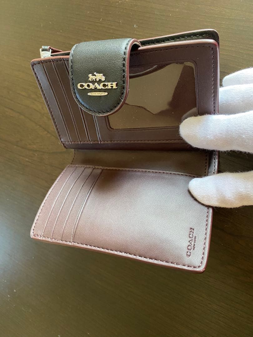 COACH エンボス加工 ブラック 二つ折り財布