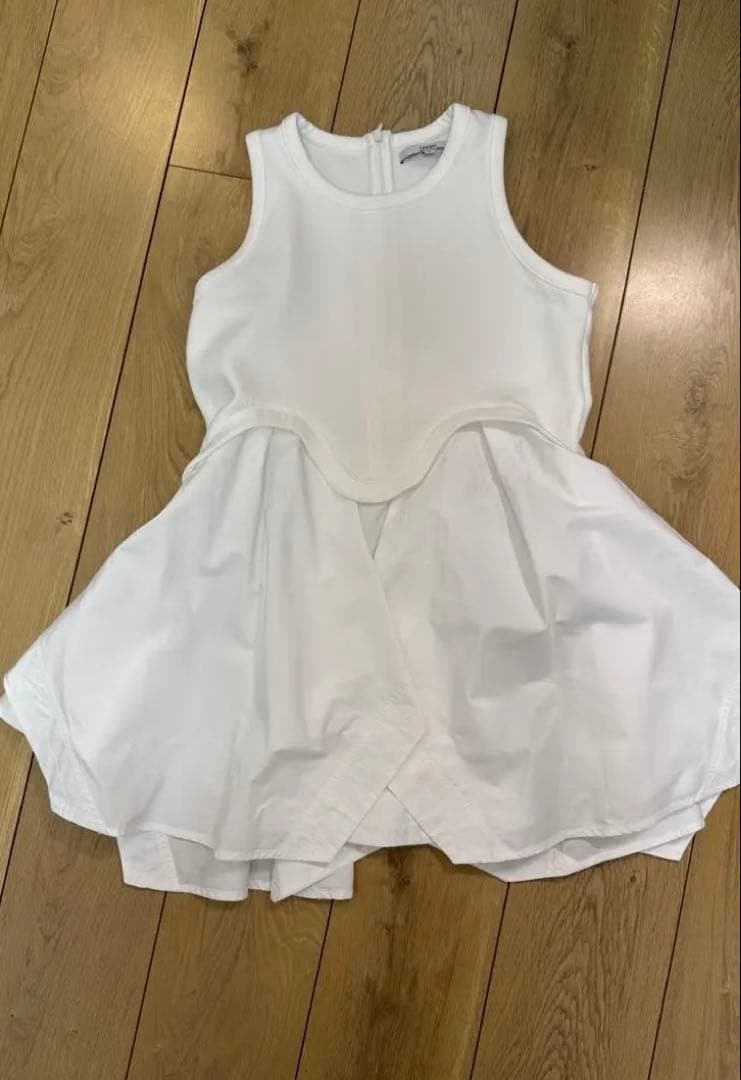 UN3D.タンクトップ ノースリーブ IRREGULAR HEM TT