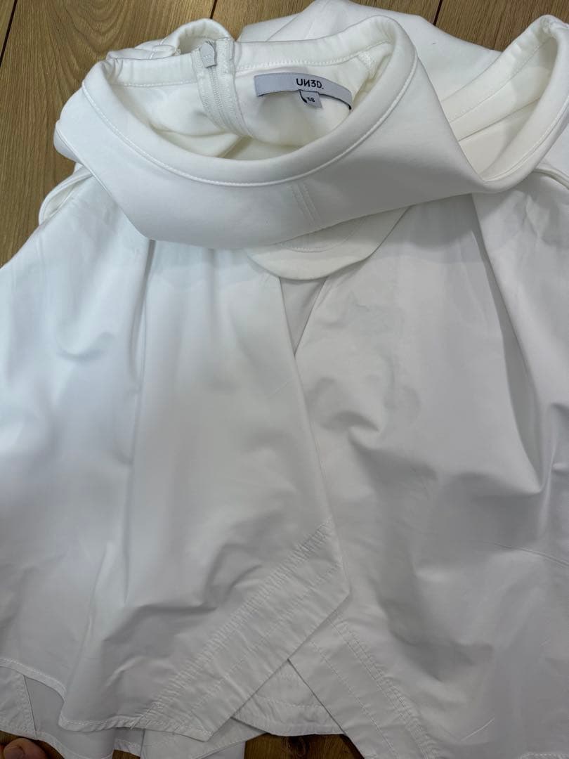 UN3D.タンクトップ ノースリーブ IRREGULAR HEM TT