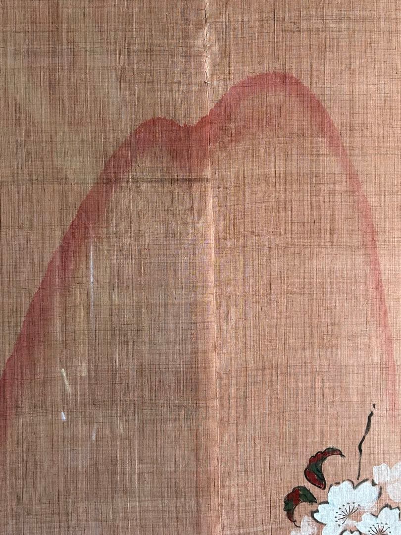 桜の花模様の薄いピンクのれん