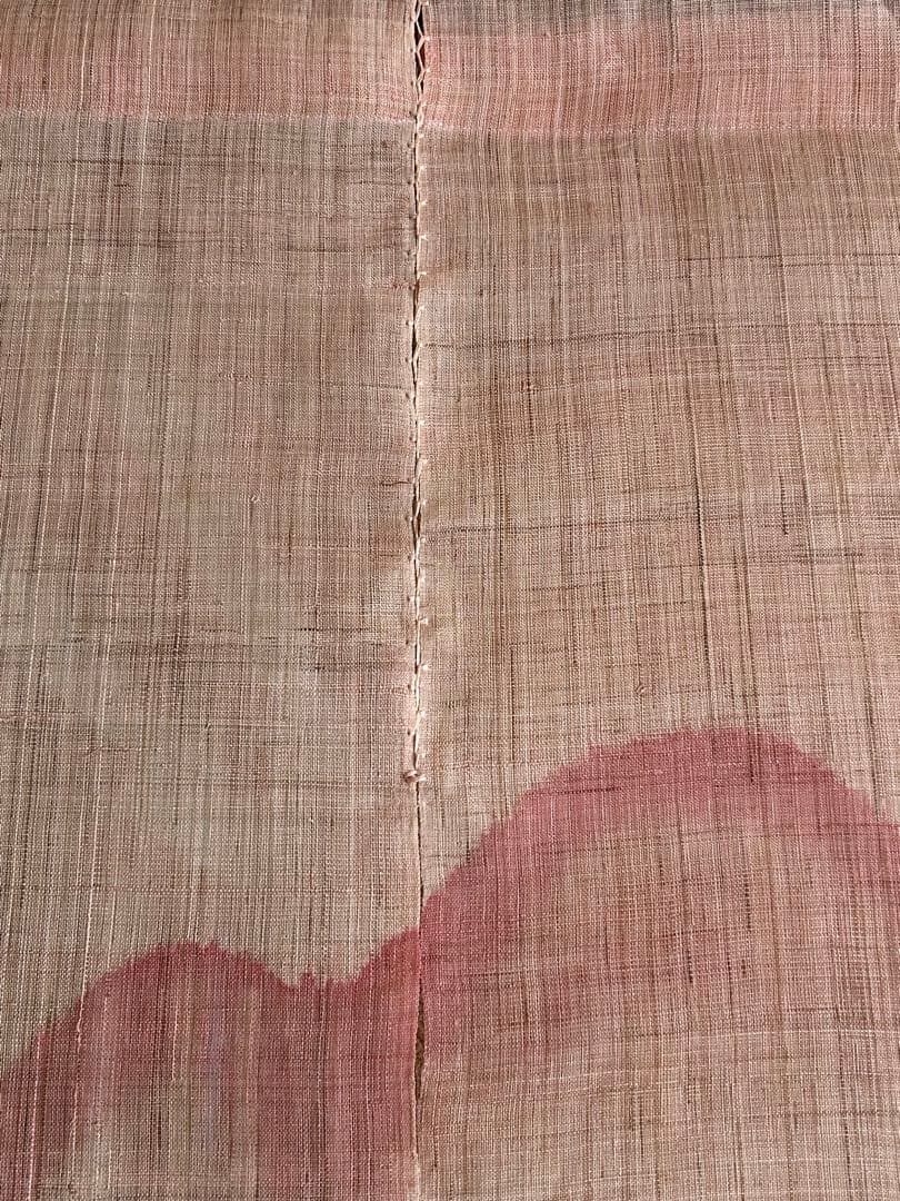 桜の花模様の薄いピンクのれん