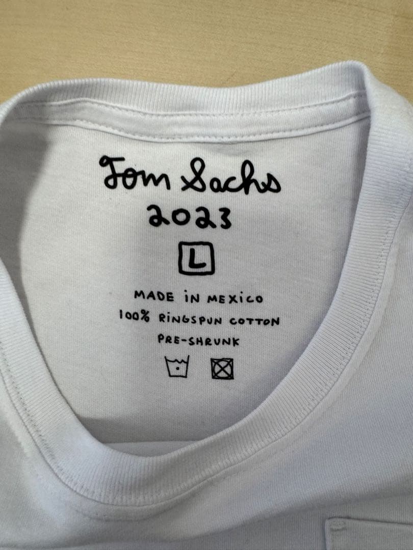 【新品】Tom Sachs トムサックス 伊勢丹 ロンT　white Lサイズ
