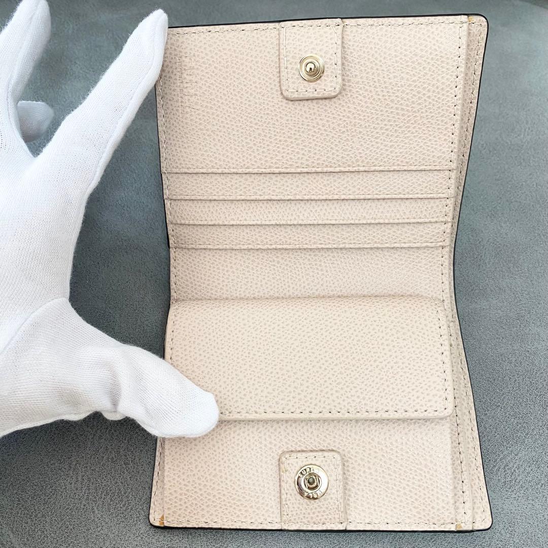 【未使用】FURLA　二つ折り財布　カメリア　べージュピンク