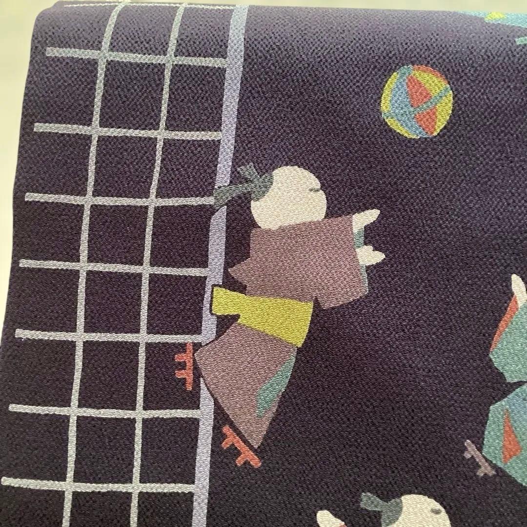 ほぼ未使用品　九寸名古屋帯 全通　正絹縮緬地　濃紫　遊ぶ童子柄　ガード加工済