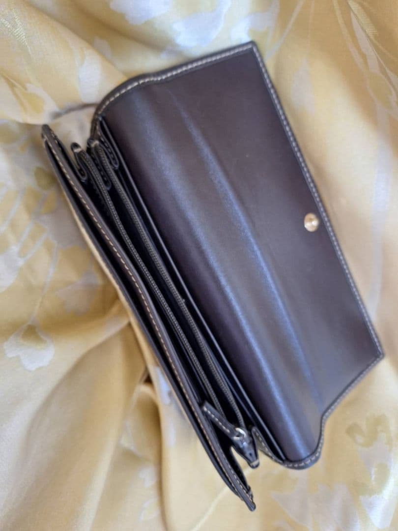 せ*ン様 GUCCI 二つ折り財布 GGパターン