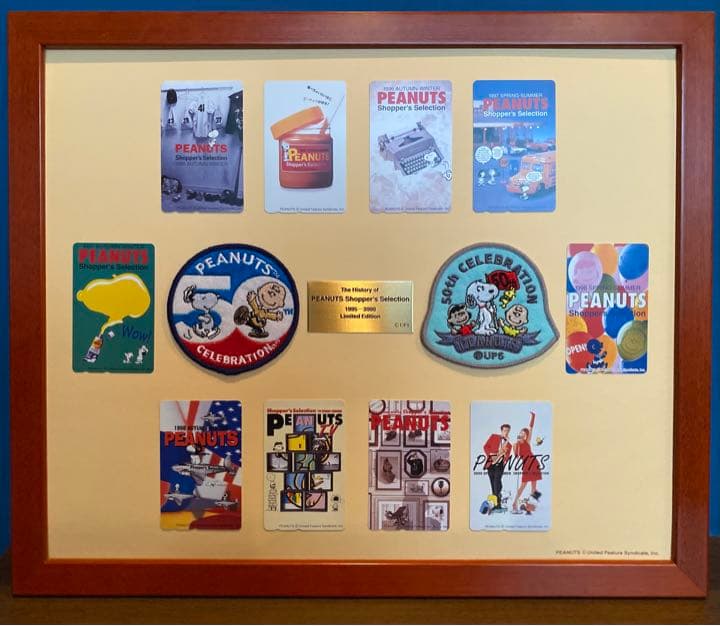 ピーナッツ50周年記念／スヌーピーテレカ&記念ワッペン額装セット【ガラス無し】