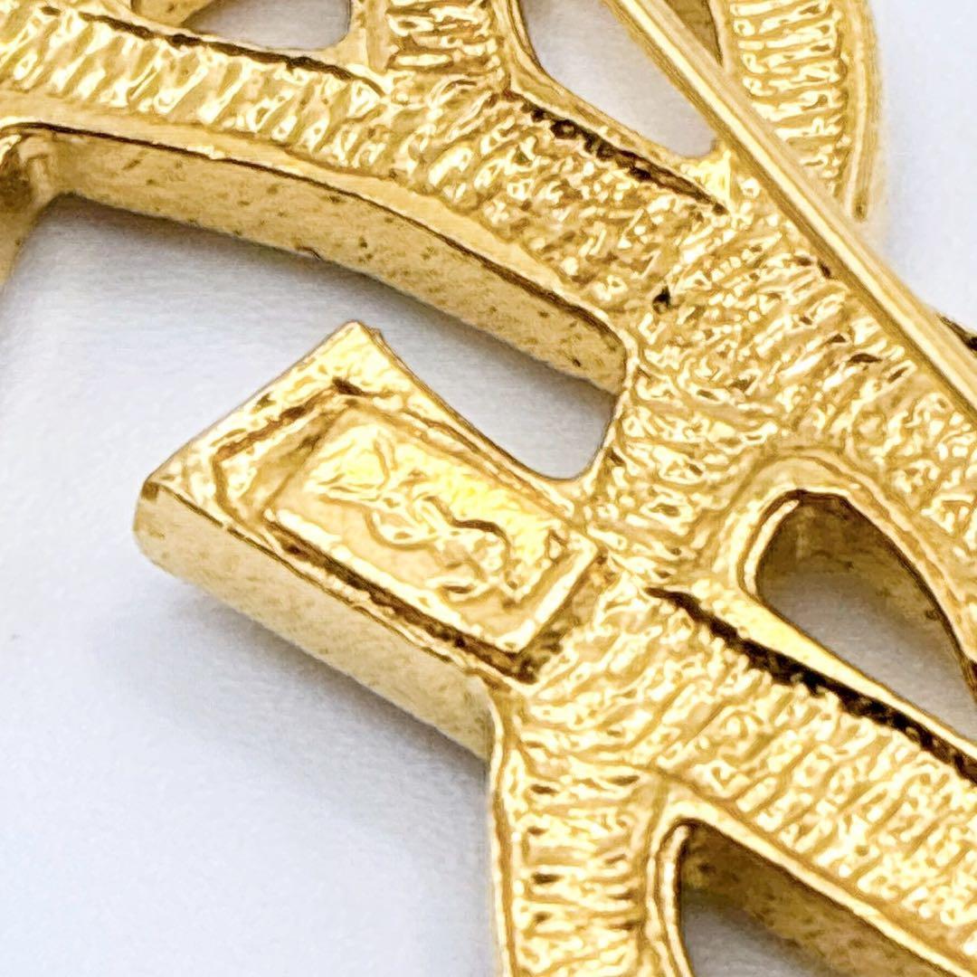 美品✨イヴサンローラン ブローチ カサンドラ ロゴ YSL ゴールド 人気