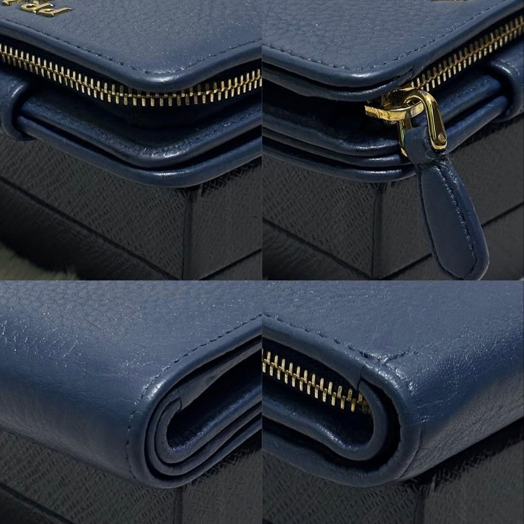 PRADA プラダ　折り財布　ラウンドファスナー　ブルー　ゴールドロゴ シボ革