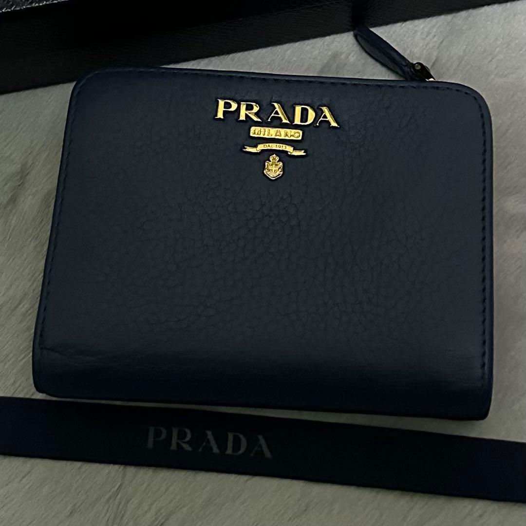 PRADA プラダ　折り財布　ラウンドファスナー　ブルー　ゴールドロゴ シボ革