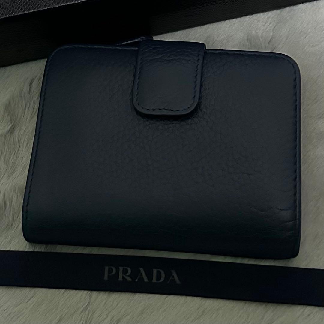 PRADA プラダ　折り財布　ラウンドファスナー　ブルー　ゴールドロゴ シボ革