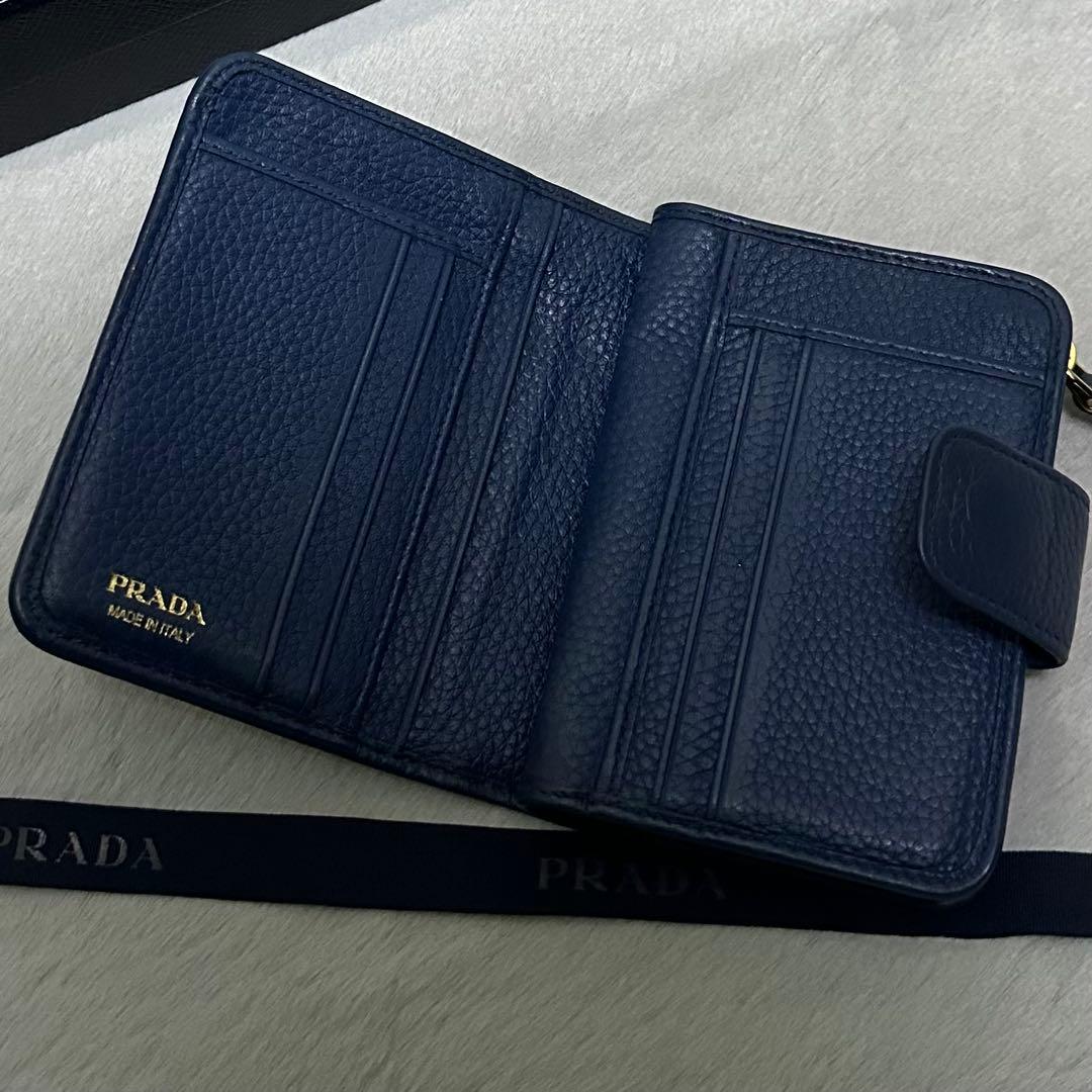 PRADA プラダ　折り財布　ラウンドファスナー　ブルー　ゴールドロゴ シボ革