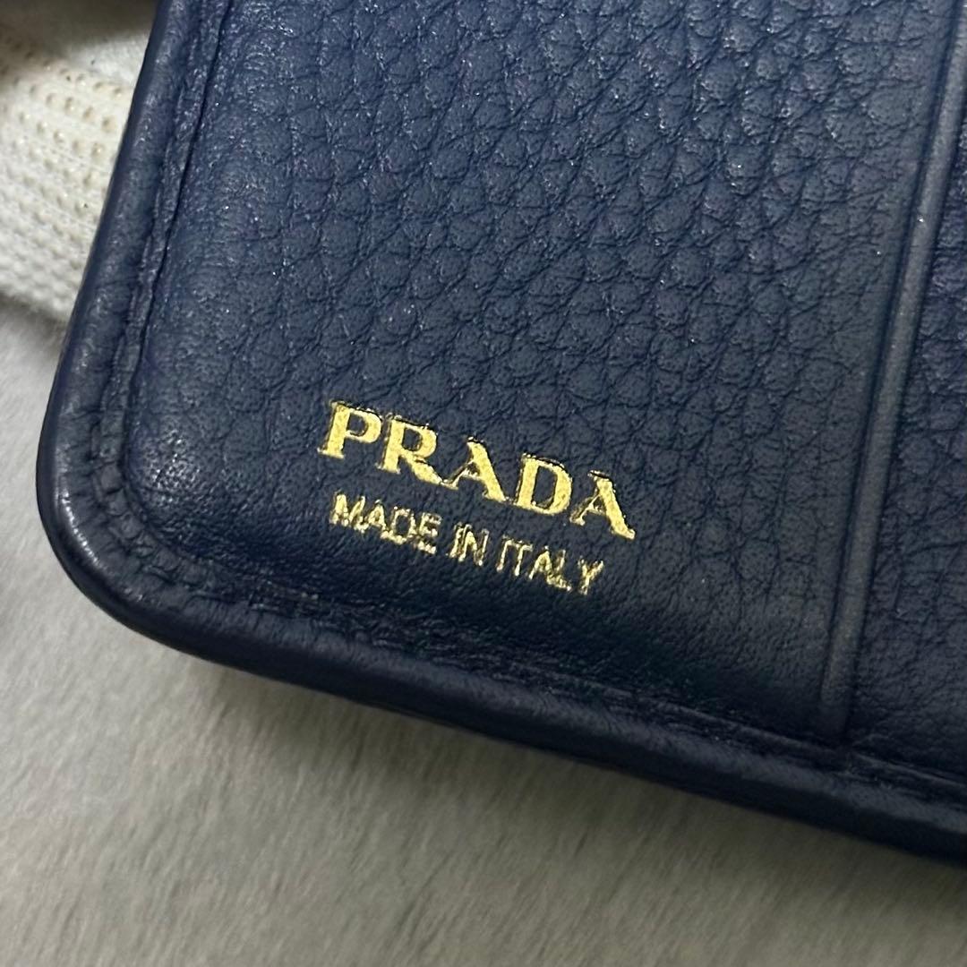 PRADA プラダ　折り財布　ラウンドファスナー　ブルー　ゴールドロゴ シボ革
