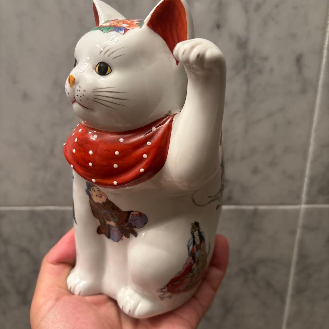 ヴィンテージ縁起の良い七福神が描かれ、可愛らしい瞳の招き猫