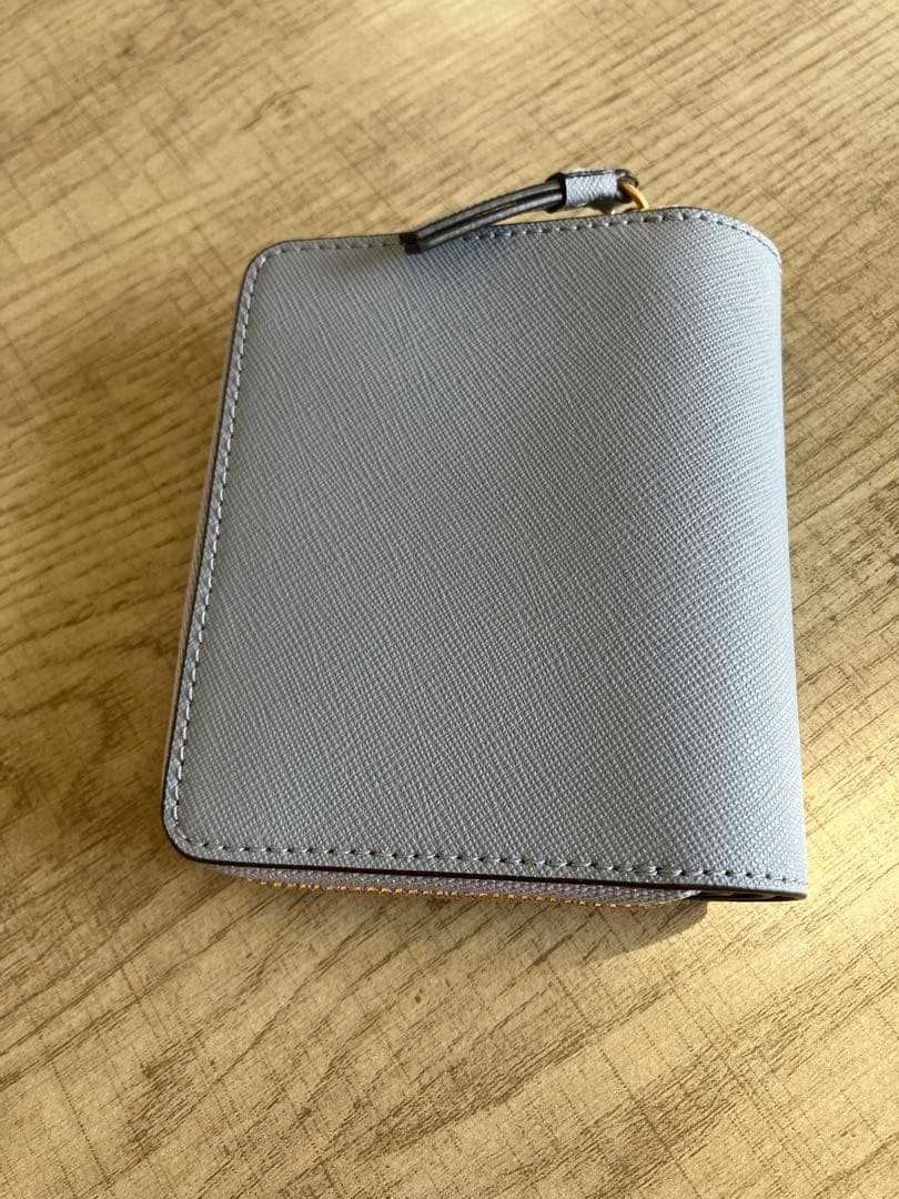 新品保管品　トリーバーチ　二つ折り財布　水色