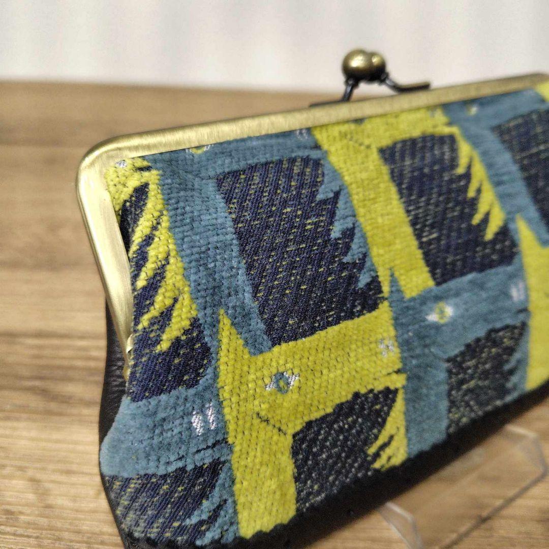 ミナペルホネン/thoroughbredサラブレットネイビー/がま口牛革長財布薄