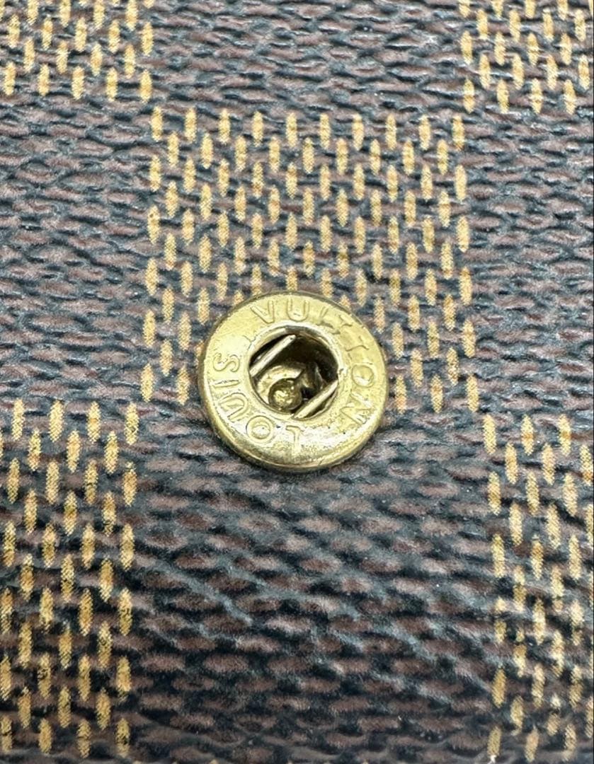 ルイヴィトン ダミエ エベヌ ポルトモネビエ トレゾール 二つ折り財布