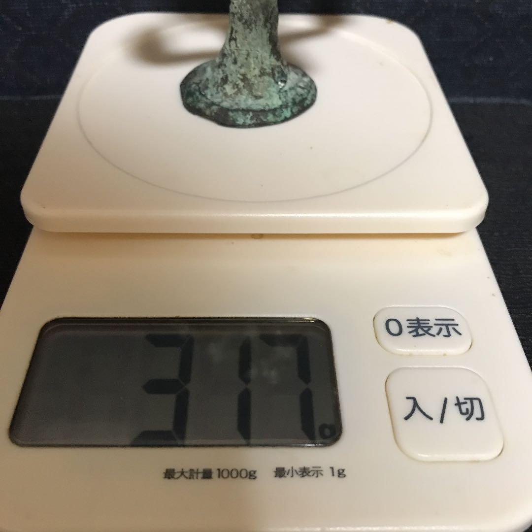 廃寺の本尊の側にあった古銅の仏像