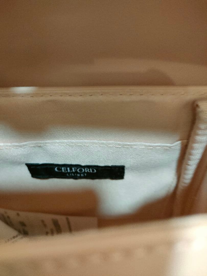 セルフォード　リュタンビジュースタッズポシェット　ピンク