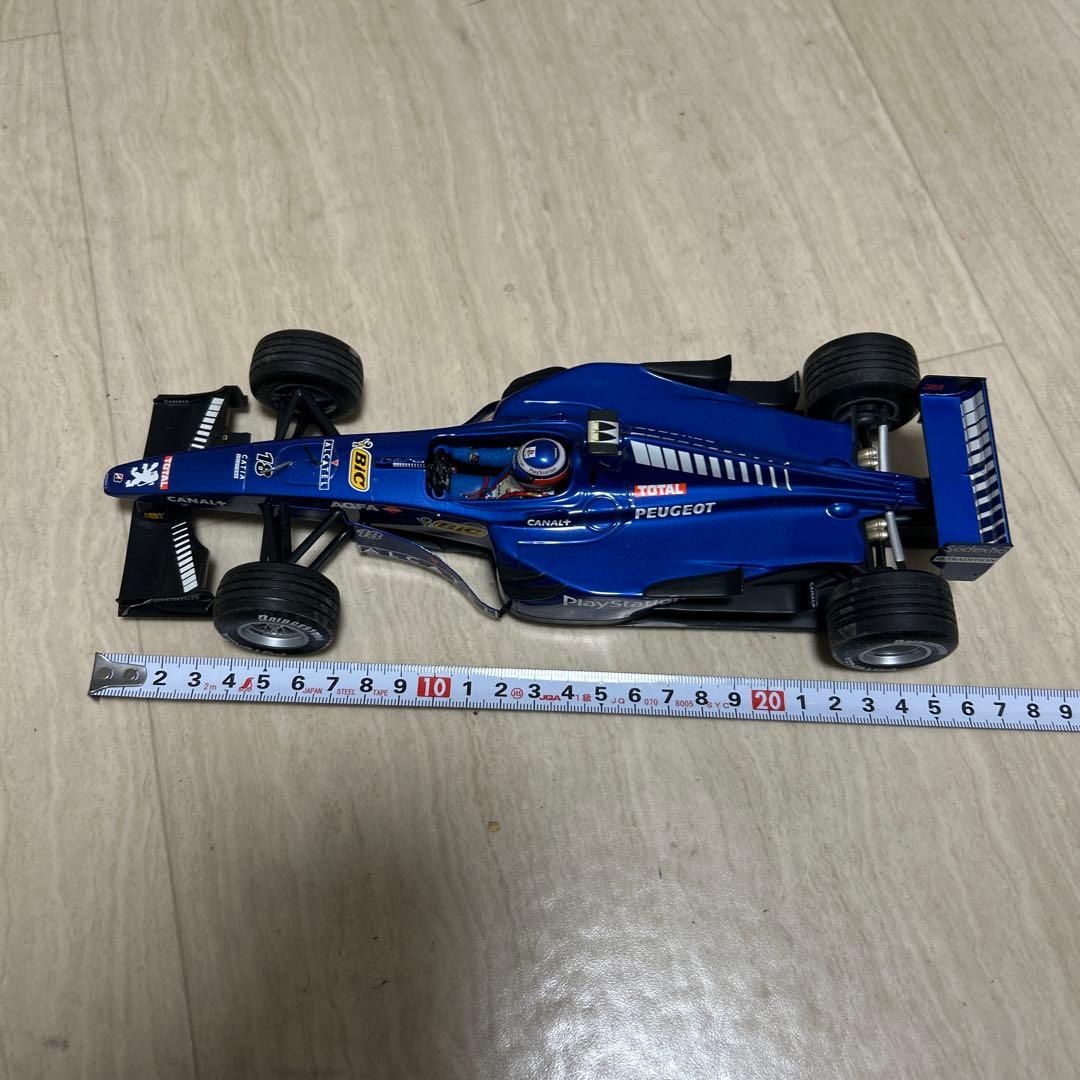 ミニチャンプス　1/18 Prost Peugeot AP02 1999