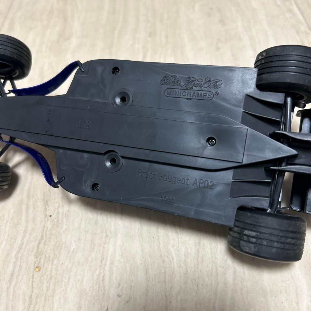 ミニチャンプス　1/18 Prost Peugeot AP02 1999