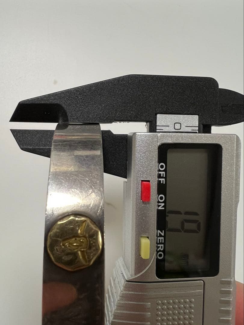 タディ&キング 平打ちバングル SV K18ロングホーンメタル