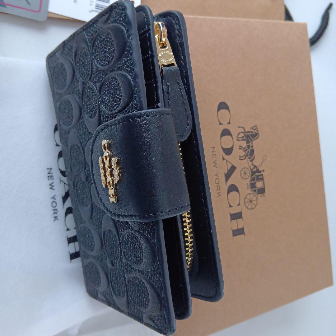 ✨️COACH ブラック シグネチャー✨️　二つ折り財布　保存袋＆お箱付き