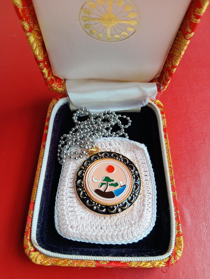 真光ペンダント、ネックレス、バッジ、ペンダントケース、ニュース記事