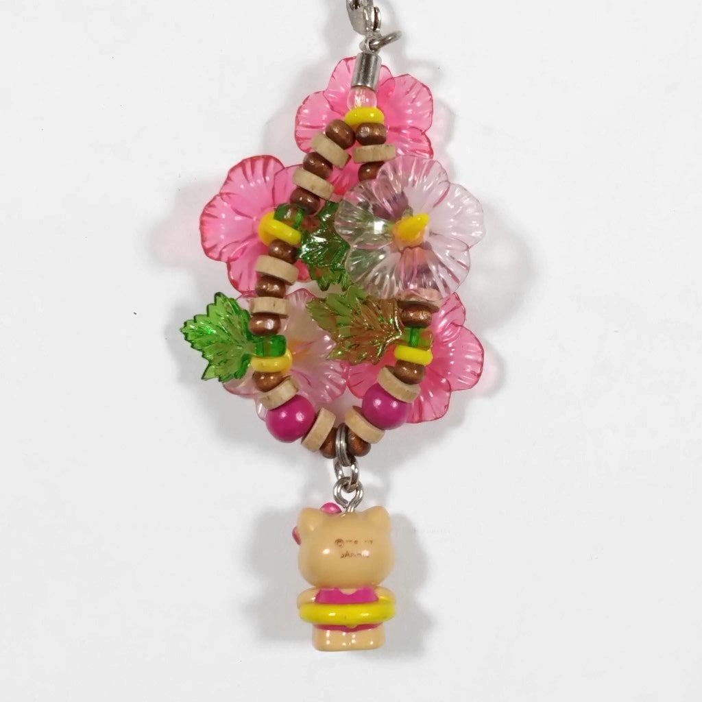 ハローキティ■夏が好き　日焼け　浮輪　水着　ハイビスカス　ファスナーマスコット